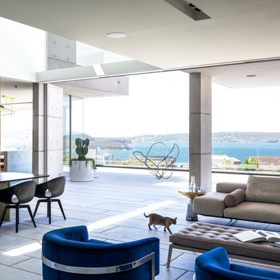 Living room - contemporary open concept gray floor living room idea in Sydney with multicolored walls