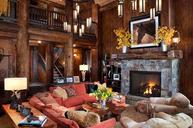 Design ideas for a large rustic open plan living room in Other with brown walls, a standard fireplace, a stone fireplace surround and carpet.