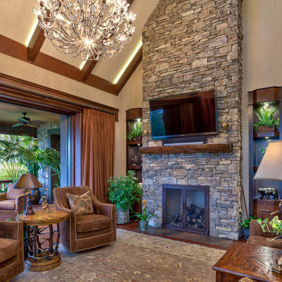 Living room - rustic living room idea in Other with beige walls