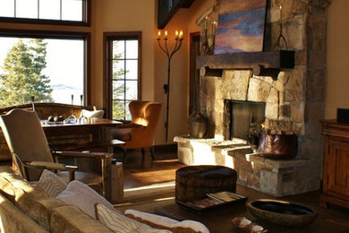 Design ideas for an expansive rustic open plan living room in Chicago with beige walls, medium hardwood flooring, a standard fireplace and a stone fireplace surround.
