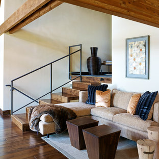 Living room - huge transitional open concept dark wood floor and brown floor living room idea in Other with white walls, a standard fireplace, a plaster fireplace and no tv