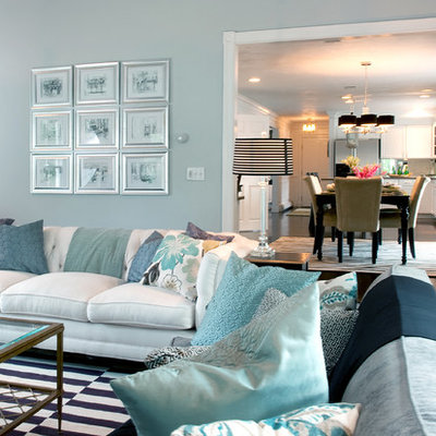 Inspiration for a timeless living room remodel in Boston with blue walls