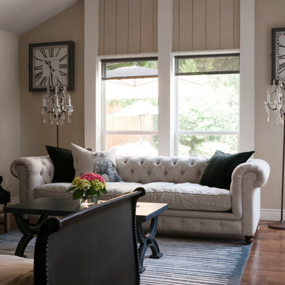 Transitional living room photo in Dallas with beige walls