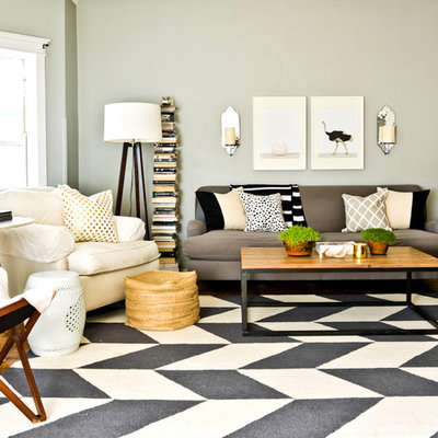 Inspiration for a contemporary living room remodel in Chicago with green walls