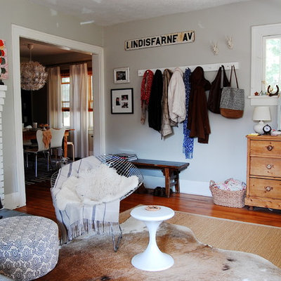 Eclectic living room photo in New York with gray walls