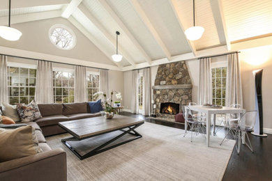 Inspiration for a large transitional open concept and formal dark wood floor living room remodel in New York with white walls, a standard fireplace and a stone fireplace