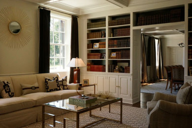 Large transitional enclosed dark wood floor living room library photo in New York with white walls and no fireplace