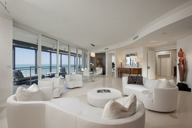 Living room - huge contemporary living room idea in Miami with white walls