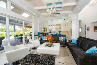 Example of a mid-sized trendy open concept living room design in Miami with white walls, no fireplace and no tv