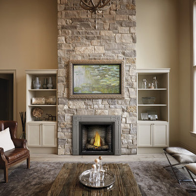 Living room - large traditional formal and enclosed medium tone wood floor and gray floor living room idea in Other with beige walls, a standard fireplace, a stone fireplace and no tv