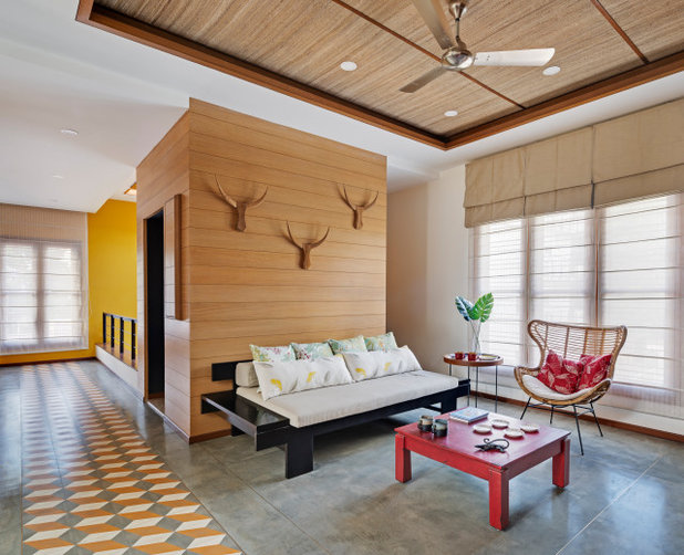 Asian Family Room by Yellow Door Architects
