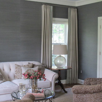 Neutral Drapery Panels with Greek Key leading edge detail.