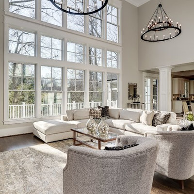 Living room - traditional open concept dark wood floor and brown floor living room idea in DC Metro with gray walls