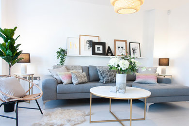 Small scandi living room in Other with white walls.