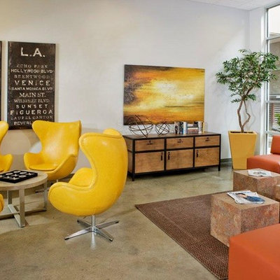 Inspiration for a contemporary concrete floor living room remodel in Los Angeles with white walls