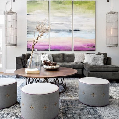 Example of a trendy living room design in New York with gray walls and no tv