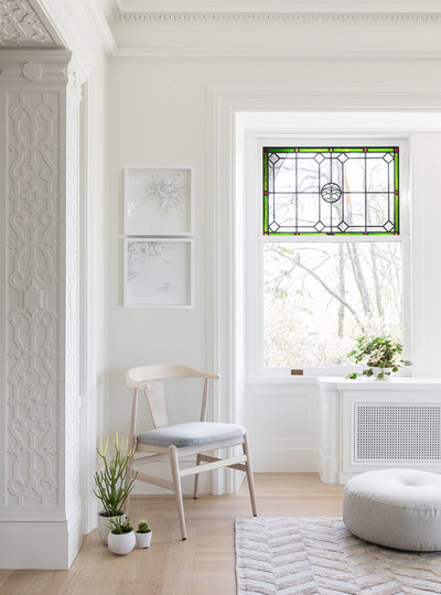 Scandinavian Living Room by NB Design Group, Inc