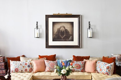 Eclectic living room photo in New York with white walls