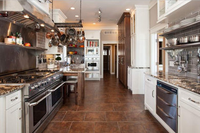 Mid-sized transitional porcelain tile kitchen photo in Orange County