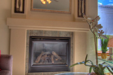 This is an example of a medium sized traditional formal open plan living room in Albuquerque with beige walls, carpet, a standard fireplace and a tiled fireplace surround.