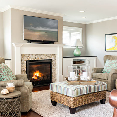 Mid-sized beach style open concept dark wood floor living room photo in Boston with a standard fireplace, a stone fireplace and a wall-mounted tv