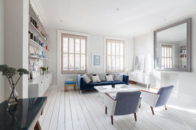 Ispirazione per un soggiorno contemporaneo di medie dimensioni e aperto con pareti bianche