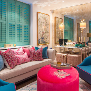 This is an example of a medium sized eclectic formal living room in London with white walls.