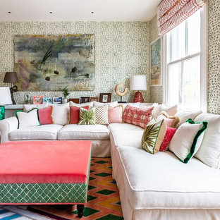 Photo of a medium sized eclectic enclosed living room in London with multi-coloured walls and multi-coloured floors.