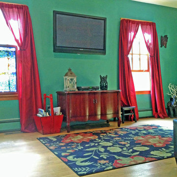 NY Interior Design Eclectic Living Room: Red Curtains, Green Wall, Wood Floors