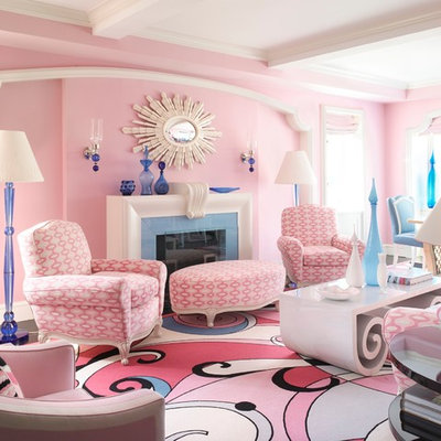 Living room - contemporary dark wood floor living room idea in New York with pink walls, a standard fireplace and no tv