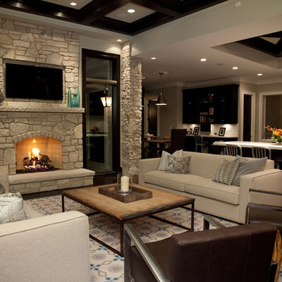 Living room - large traditional formal and open concept dark wood floor living room idea in Chicago with beige walls, a standard fireplace, a stone fireplace and a wall-mounted tv