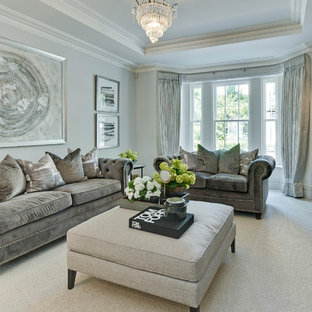 Design ideas for a large classic living room in Surrey with grey walls, carpet, grey floors and no tv.