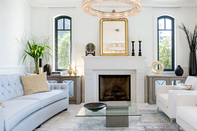 Huge transitional formal and open concept gray floor living room photo with white walls and a standard fireplace