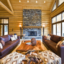 Rustic Living Room by Sticks + Stones Design Group Inc.