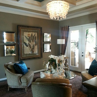 Inspiration for a large timeless formal and open concept porcelain tile living room remodel in Orlando with brown walls and no tv