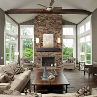 Example of a trendy living room design in Columbus with a stone fireplace