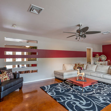 Open Great Room with Feng Shui Wall Openings and Red Accent