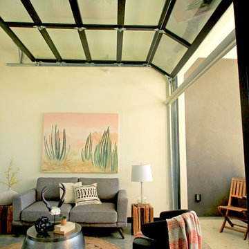 Open living room with glass overhead garage door
