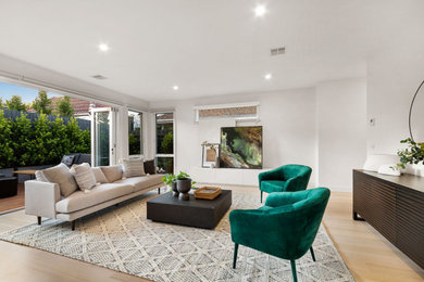 Trendy living room photo in Melbourne