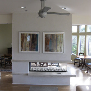Open Three Sided Gas Fireplace with Floating Hearth