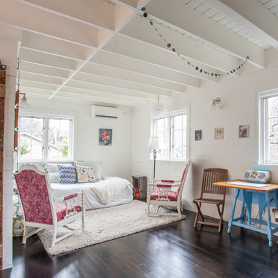 Living room - small cottage open concept dark wood floor living room idea in Other with white walls