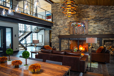 Inspiration for a rustic formal and open concept living room remodel in Portland with a standard fireplace, a stone fireplace and no tv