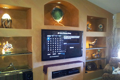 Photo of a medium sized open plan living room in Phoenix with beige walls and a built-in media unit.