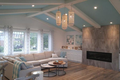 Example of a beach style living room design in Toronto