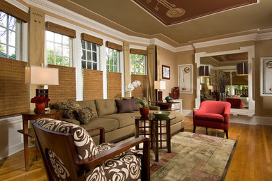 Living room - mid-sized transitional formal and enclosed medium tone wood floor living room idea in Boston with beige walls
