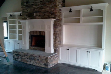 Living room photo in Other with a standard fireplace and a brick fireplace