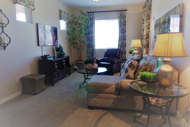 Example of a transitional open concept dark wood floor and brown floor living room design in Phoenix with no tv