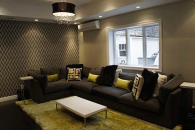 Example of a mid-sized trendy enclosed carpeted living room design in New York with gray walls