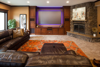Example of a large classic formal and enclosed carpeted living room design in Chicago with brown walls, a standard fireplace, a stone fireplace and a wall-mounted tv