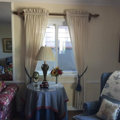 Example of a mid-sized classic formal and enclosed living room design in Orange County with beige walls, no fireplace and no tv
